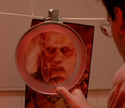 Egon examines photo of Vigo