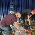 SFX team sets up frozen adventurers in ballroom set (Credit: Alex Vlcek)