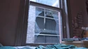 Trevor's broken window on third floor, seen in Tested 4/2/2024