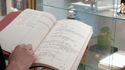 Script Supervisor's copy in display case at Ghost Corps, seen in Tested YouTube 11/23/21