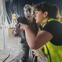 SFX team sets up frozen adventurers in ballroom set (Credit: Alex Vlcek)
