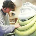 Camilla Henneman-Adan works on Ghostbusters II Slimer suit, seen in Industrial Light & Magic: Into the Digital Realm, p.68