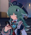 Huohuo holding phone (Credit: Xander Fangsworth Ch. lucid)