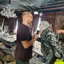 SFX team sets up frozen adventurers in ballroom set (Credit: Alex Vlcek)