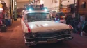 Ecto-1 in garage bay of Firehouse set, seen in 3/5/2024 Tested