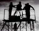 EEG crew silhouetted against New York skyline on Temple of Gozer set, seen in Making Ghostbusters p.171