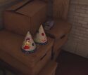 Children's party hats seen on second floor of Firehouse in Ghostbusters: Spirits Unleashed