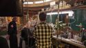 Filming cast entering lab, seen in Welcome to the Paranormal Discovery Center special feature