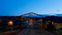 Entrance to Shandor Mining Company, lit at night (Credit: Michael Ambrose)