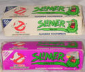 Top item is mint gel flavor toothpaste and the bottom being grape gel flavor Slimer Toothpaste.