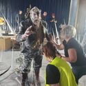 SFX team sets up frozen adventurers in ballroom set (Credit: Alex Vlcek)