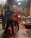 Gil Kenan, Annie Potts, and James Acaster in Firehouse basement set (Credit: Alexis Forte)