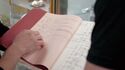 Script Supervisor's copy in display case at Ghost Corps, seen in Tested YouTube 11/23/21