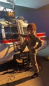 Mckenna Grace poses with Ecto-1 during pruduction in 2023, posted on January 30, 2024 (Credit: Mckenna Grace)