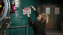 Filming cast entering lab (Credit: FilmInk Magazine)