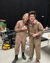 Logan Kim and Carrie Coon in flight suits on a set (Credit: Logan Kim)