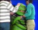 Robin Navlyt in Slimer suit prepped by ILM crew, seen on Entertainment Tonight in 1989 (Credit: Alex Newborn)