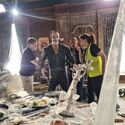 SFX team sets up frozen adventurers in ballroom set (Credit: Alex Vlcek)