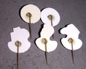 Backs of the pins (note there are two Logo pins in the photo)