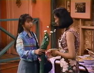 Tina shows her mother the Mai flowers