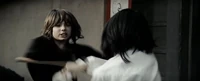 Young Snake Eyes and Storm Shadow, battling.
