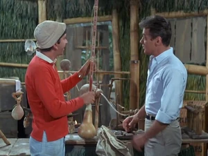 Gilligan examines the Professor's thermometer