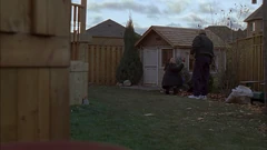 Vlcsnap-2025-09-25-21h40m24s022.png (1.82 MB) View past the planter and the ceramic pot to the playhouse. Another part of the terrace with wood railing is visible.