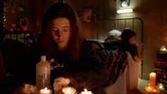 Brigitte-disinfects-needle.jpg (309 KB) Brigitte preps a needle to give her sister a navel piercing