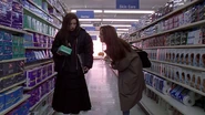 In the drug store, Ginger is plagued by her menstrual pains.