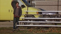 Vlcsnap-2025-10-08-21h51m29s649.png (2.25 MB) The van on the school parking lot next to the bleachers.