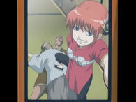 Kagura taking a picture after beating up Sougo in the Episode 78