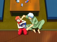 Kagura and Gintoki fighting over an electric fan in Episode 21