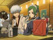 Gintoki and Tama at the bar while Tama is drinking oil in Episode 112