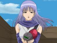 Sarutobi holding Katsura's timebomb in Episode 28