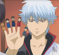 Gintoki wearing finger puppets in Episode 9