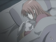 Kagura sleeping with her first pet rabbit in Episode 10