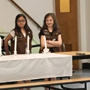 Michelle and her troop bridging from Brownies to Juniors
