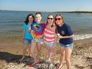 Jennie and her troop on a camping trip in 2013