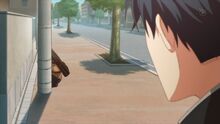 Mafuyu hides behind a pole