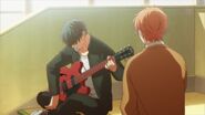 Ritsuka plays the guitar