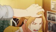 Akihiko rubbing Haruki's head