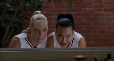 Brittany and Santana spying on Will and Emma.