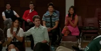 Sugar and Rory sitting in front of Tina and Mike and Blaine and Kurt in Big Brother.