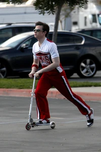 Chris Colfer-Cheerio on Scooter.jpg