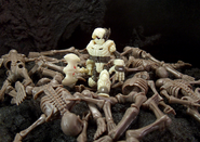 Ku emerging from a Earthen Spawn pile[2]