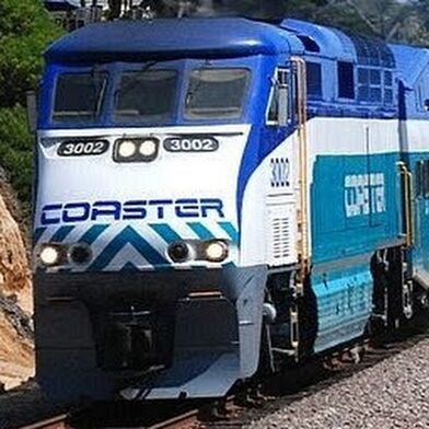 Coaster F59phi 3002 goes by Del Mar, CA.