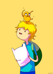 Finn with jake on his head