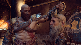 Kratos sosteniendo la cabeza de Mimir