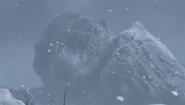 Jörmungandr sleeping on the side of a mountain.