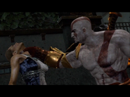 Kratos strangles Hera.